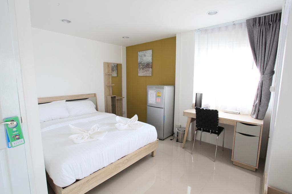 Living By Grace Apartment Si Sunthon Екстериор снимка